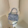 Bolsas de Alto Valor Estético para Mujer Verano 2026 Nuevo Bolso de Hombro para Viajes Diarios Moda Simple Nicho Elegante Bolso de Hombro Cruzado