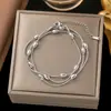 Conjunto de Colar de Aço Titânio para Mulheres Dongguan Transfronteiriço, Conjunto de Colar e Pulseira de Coração de Alta Qualidade, Conjunto de Joias da Moda Leve de Luxo