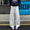 Calça moletom casual esportiva estilo americano com barra curva para homens, calça reta patchwork de bolso grande para outono, calça larga moderna e solta