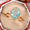 Anillo de lujo Cao Shi con diseño transfronterizo europeo y americano, corona dorada y circón azul ovalado para mujer