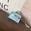 Nuevo Colgante de Bolso Kelly de Tablero Horizontal con Patrón de Mini Cocodrilo Llavero de Coche Bolso para Auriculares Exquisito de Gama Alta Creativo para Mujer