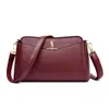 Nova Estilo Simples e Elegante Bolsa de Ombro Transversal para Mãe de Meia-Idade Mochila de Grande Capacidade Portátil Casual Multicamadas Bolsa Feminina