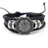 Pulsera trenzada multicapa de cuero de vaca estilo étnico retro con colgante redondo de aleación tallada, accesorio unisex para hombres y mujeres