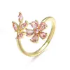 Novo Produto Transfronteiriço Aogu: Luxo Leve, Anel de Cobre Versátil com Banho de Ouro 18K e Design de Flor com Zircônia Cúbica, Anel Aberto para Mulheres, Único e de Alto Padrão