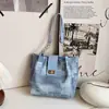 Bolso de mujer transfronterizo de gran capacidad, nueva colección otoño 2026, bolso de hombro versátil y a la moda, bolso tote moderno y casual para el trabajo y el uso diario