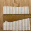 21 algodón 100%R tejido teñido en hilo a rayas pequeño fresco camisa pijama tela fábrica mayoreo