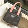 Nueva bolsa de almuerzo portátil impermeable estilo coreano de color contrastante, bolsa para mamá, bolsa para llevar al trabajo, bolsa para snacks y artículos varios, bolso para mujer
