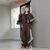 Pedido al por mayor Conjunto Deportivo de Chándal Otoño 2026 Chaqueta con Cremallera Rayas Diagonales Pantalones Anchos
