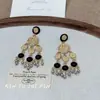 Pendientes de Borla Estilo Palacio Retro Negro Dorado para Mujer 2025 Nuevo Diseño de Nicho Lujo Accesible Pendientes Elegantes Pendientes Retro