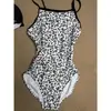 Traje de baño de una sola capa para mujer al por mayor, moderno estampado de leopardo Lycra Dupont una pieza triángulo deportivo de carreras profesional para piscina