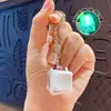 Llavero colgante de Tetris de nueve teclas de moda en colores macaron, accesorio de juguete de botón para aliviar el estrés, venta al por mayor