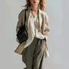 Blazer casual de rayas verticales color caqui con hombros caídos y tobillos fruncidos, pantalones holgados de pierna ancha con textura marrón grisáceo para mujer, 2026 Transfronterizo