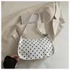 Bolso brillante de charol de lunares de nicho para mujer, nuevo bolso cruzado de moda 2026, bolso para el hombro y debajo del brazo súper popular