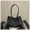 Bolso Casual de Gran Capacidad 2025 Invierno Nuevo Estilo Bolso de Hombro Personalizado para Mujer Bolso Tote Retro Simple de Moda