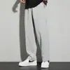 Pantalones Primavera y Otoño Nuevos Hombres Estilo Coreano Color Sólido Elástico Casual Deportivo Pareja Caída Pierna Recta Mismo Estilo Celebridad de Internet Pantalones de Chándal