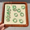 Transmisión en vivo fuente jade africano jade Dulong flores flotantes de hielo anillo de jadeíta cuarcita flores flotantes anillo de correr adornos de jade diy