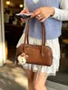 Bolso de Mano con Patrón Tejido Bolso Tote para Mujer 2026 Nuevo Estilo Transfronterizo Lujo Ligero de Gama Alta Versátil para el Trabajo Bolso de Hombro para Debajo del Brazo