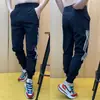 Pantalones Deportivos Rayados para Hombre Verano Delgados Secado Rápido Elásticos Leggings Modernos Versátiles Casuales Pantalones Cortos tipo Harlan