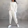2026 Nuevo Conjunto de Ropa para Mujer de Comercio Exterior Transfronterizo Europeo y Americano, Color Sólido, Cuello Redondo, Manga Larga con Pantalones de Bolsillo para Mujer