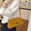 Bolso de mujer 2026 nuevo modelo, cadena de lujo ligero nicho bolso baguette retro, bolso de hombro cruzado de alta gama para commuting