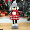Nuevas decoraciones navideñas transfronterizas: figura de pingüino retráctil, adorno de pingüino navideño rojo y gris para decoración de ventana