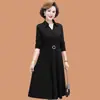 Elegante y moderno vestido de color liso con cuello de polo abotonado y manga larga para mujer, nuevo estilo de otoño, falda larga de línea A que ciñe la cintura, transfronterizo