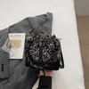 Bolso bandolera tipo cubo para mujer 2026 verano nuevo de alta gama lujo ligero moda nicho bolso de hombro trabajo bolso tote pequeño