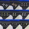 Pendientes de botón con letras y logo de marca de lujo europea y americana transfronteriza, versión de alta gama nueva, pendientes de trébol de cuatro hojas con aguja de plata para mujer, venta al por mayor
