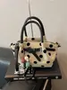 Bolsa de Mano Cruzada de Hombro Estilo Perezoso de Gran Capacidad con Lunares Elegante Simple Casual Verano 2026 Nuevo Estilo