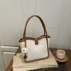 Bolsas Populares de Este Año Bolso Cubo para Mujer 2025 Bolso Nuevo de Aspecto Caro Retro Otoño Bolso de Hombro Único para el Brazo Bolso de Viaje