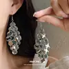 Pendientes de Gancho Europeos y Americanos Transfronterizos con Hojas Irregulares Caladas y Borlas, Pendientes Elegantes y de Gama Alta, Accesorios de Oreja Minimalistas de Nicho al por Mayor