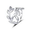 Moda europea y americana anillo de hoja de trébol de tres pétalos para mujer latón chapado en oro de 18 quilates moda simple personalidad anillo de sauce liso