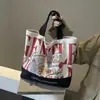 Bolsa de lona grande com estampa de letras para mulheres, novo estilo 2026, Bolsa de ombro estampada moda Gentlewoman, bolsa tote