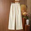 Calidad garantizada, seda, rejuvenecedores, pantalones casuales estilo chino para otoño e invierno con sutiles estampados florales y cintura con borlas, pantalones de pierna ancha para mujeres de mediana edad