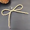 Nuevo Colgante de Lazo de Amor Plateado para Funda de Teléfono Móvil Llavero Colgante Versátil Exquisito Regalo Pequeño Accesorios para Equipaje
