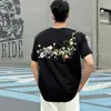Camiseta Guochao Heavy Industry Bordada Floral de Manga Curta para Homens e Mulheres Verão Streetwear Americano Solta Casual Camiseta Par Top