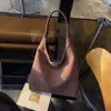 Bolso de mano de gran capacidad, moderno y texturizado, estilo coreano, para mujer, nuevo bolso de hombro y axila casual para otoño e invierno 2026