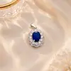 Colgante vintage de circón color rubí para mujer, colgante de collar de flor de diamantes completos, accesorio de cadena para clavícula de lujo ligero de alta gama