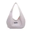 Las populares carteras pequeñas frescas y elegantes de este año para mujer, nuevos bolsos de hombro de lunares de moda para el otoño de 2026, bolsos versátiles para el antebrazo