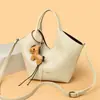 Elegante y estiloso bolso de mano con colgante de poni para mujer, nuevo modelo 2026, adecuado para ir al trabajo, bolso de hombro moderno y versátil, bolso cruzado
