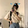 Top básico suelto de color liso, camiseta blanca de algodón puro de manga corta, tendencia de moda para mujer con cuello polo de verano 2026