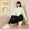 Bolsillo con etiqueta de cuero forrado de borrego engrosado leggings otoño e invierno para mujer 2026 pantalones cálidos pantalones de venta caliente transfronteriza