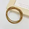 Goma Elástica de Alta Elasticidad Goma para el Cabello Simple Versátil Anillo Básico para el Cabello para Coletas Moños No Daña el Cabello Goma Cubierta Goma para el Cabello Mujeres