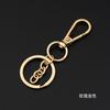 Llavero de metal con forma de perro de oro rosa, accesorio de joyería para manualidades, colgante para bolso de muñeca.