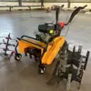 Desmalezadora autopropulsada de gasolina con tracción en las cuatro ruedas, motocultor rotatorio pequeño de empuje manual, cortacésped para huertos y jardines