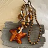 Colar com Pingente de Estrela-do-Mar de Madeira Estilo Boêmio para Mulheres, Estilo Litorâneo, Corrente Longa para Suéter de Nicho, Acessório Vintage Exagerado