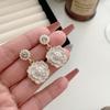 Aretes de Camelia con Perla y Aguja de Plata S925 de Qingdao para Mujer Coreanos Dongdaemun Súper de Hadas de Alta Gama