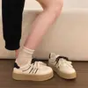 Parte superior de malla, suela gruesa, estilo de entrenamiento alemán, nueva colección 2026 para mujer, casual y versátil, zapatillas deportivas ligeras y transpirables para primavera y verano