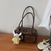 Bolso de Axila de Nicho para Mujer 2026 Modelo Nuevo Gran Capacidad Retro Simple Bolso de Mano para Viajes Bolso de Hombro Versátil a la Moda