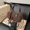 Bolsa de Bowling de Couro Fosco 2024 Nova Elegante da Moda Portátil Transversal Texturizada Retro Ombro Pequena Quadrada